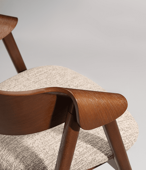 Detailed view of the Dina Arm Collection showcasing premium wood craftsmanship, ergonomic armrest design, and textured upholstery.