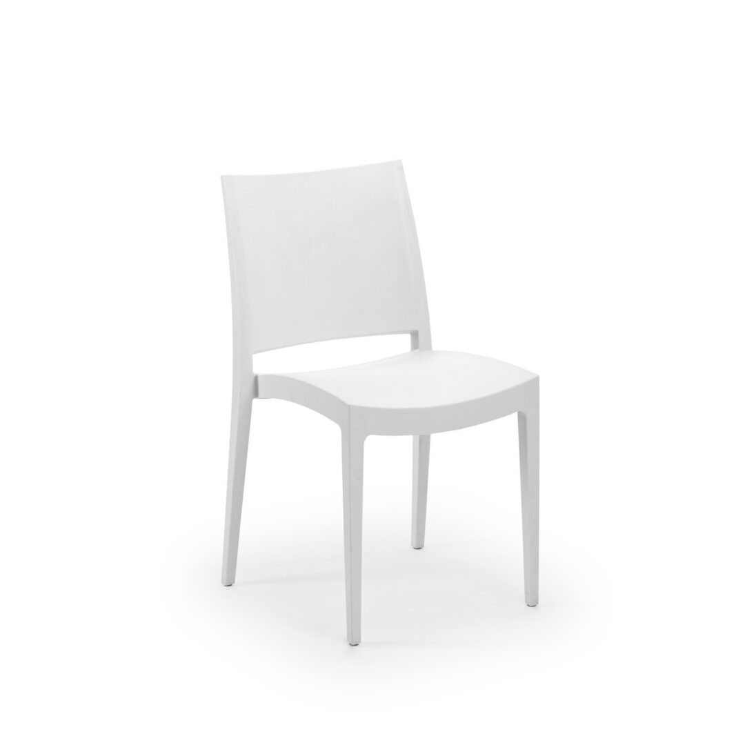 ivory Specto chairs at a contemporary restaurant dining table in warm natural light, in-stock commercial seating available now from Keca's Florida showroom.
